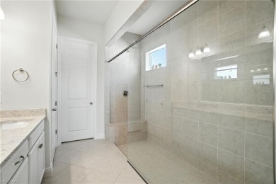 Modern, move-in ready, and effortlessly fresh--this North Naples on Vanderbilt Country Club in Florida - for sale on GolfHomes.com, golf home, golf lot