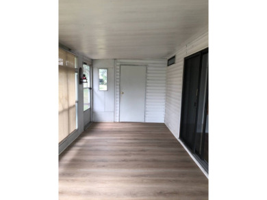 Stunning 2 Bed / 2 Bath Remodeled Home with Gorgeous Water Views on The Meadows At Countrywood in Florida - for sale on GolfHomes.com, golf home, golf lot