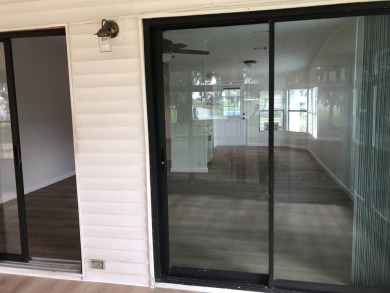 Stunning 2 Bed / 2 Bath Remodeled Home with Gorgeous Water Views on The Meadows At Countrywood in Florida - for sale on GolfHomes.com, golf home, golf lot