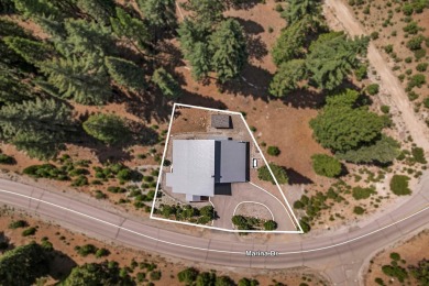 This well-appointed mountain style retreat offers excellent on Bailey Creek Golf Course in California - for sale on GolfHomes.com, golf home, golf lot