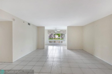 Experience stunning lake views from this beautifully updated on Westchester Golf and Country Club in Florida - for sale on GolfHomes.com, golf home, golf lot