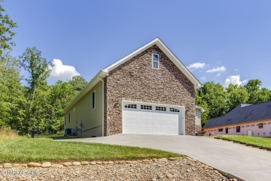 Welcome to 129 Dudi Trail in Kahite! The community offers an on Tellico Village -The Links At Kahite Golf Course in Tennessee - for sale on GolfHomes.com, golf home, golf lot