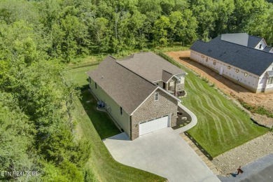 Welcome to 129 Dudi Trail in Kahite! The community offers an on Tellico Village -The Links At Kahite Golf Course in Tennessee - for sale on GolfHomes.com, golf home, golf lot