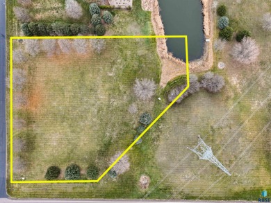 Discover the epitome of coveted living in this 1.75 acre parcel on Spring Creek Country Club in South Dakota - for sale on GolfHomes.com, golf home, golf lot