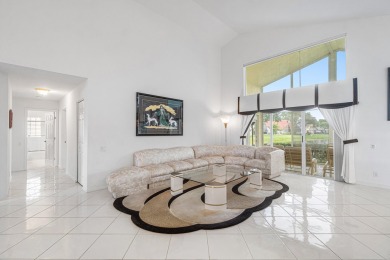 Enjoy STUNNING long lake views from this beautifully maintained on Westchester Golf and Country Club in Florida - for sale on GolfHomes.com, golf home, golf lot