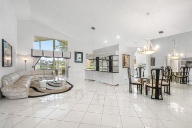 Enjoy STUNNING long lake views from this beautifully maintained on Westchester Golf and Country Club in Florida - for sale on GolfHomes.com, golf home, golf lot