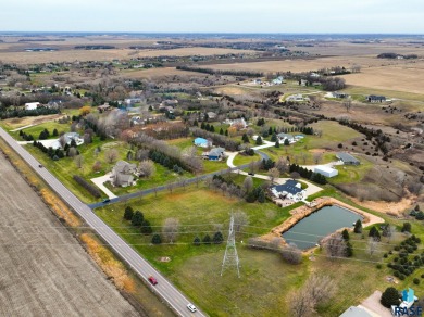Discover the epitome of coveted living in this 1.75 acre parcel on Spring Creek Country Club in South Dakota - for sale on GolfHomes.com, golf home, golf lot