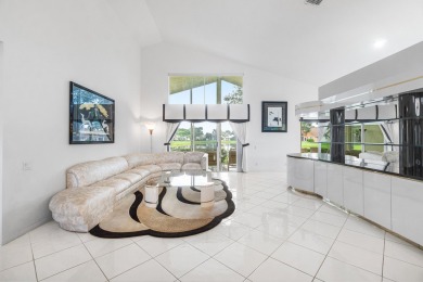 Enjoy STUNNING long lake views from this beautifully maintained on Westchester Golf and Country Club in Florida - for sale on GolfHomes.com, golf home, golf lot