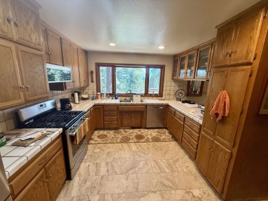 Majestic Mountain Retreat in Lake Almanor West! Nestled just on Lake Almanor West Golf Course in California - for sale on GolfHomes.com, golf home, golf lot