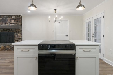 This beautifully remodeled home in Hot Springs Village offers on Cortez Golf Course in Arkansas - for sale on GolfHomes.com, golf home, golf lot