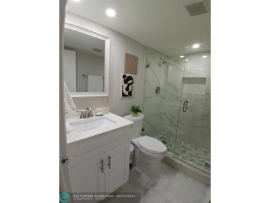 REMODELED BEAUTIFUL 1ST FLOOR CONDO! This RARE 1st Floor Golf on Palm-Aire Country Club and Resort - Palms in Florida - for sale on GolfHomes.com, golf home, golf lot