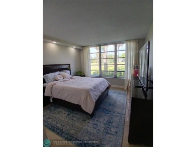 REMODELED BEAUTIFUL 1ST FLOOR CONDO! This RARE 1st Floor Golf on Palm-Aire Country Club and Resort - Palms in Florida - for sale on GolfHomes.com, golf home, golf lot