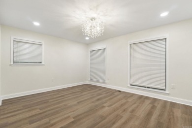 This beautifully remodeled home in Hot Springs Village offers on Cortez Golf Course in Arkansas - for sale on GolfHomes.com, golf home, golf lot