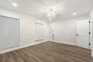 This beautifully remodeled home in Hot Springs Village offers on Cortez Golf Course in Arkansas - for sale on GolfHomes.com, golf home, golf lot