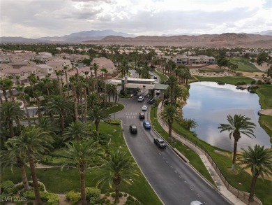 This impressive two-story home is nestled in the prestigious on Rhodes Ranch Golf Club in Nevada - for sale on GolfHomes.com, golf home, golf lot