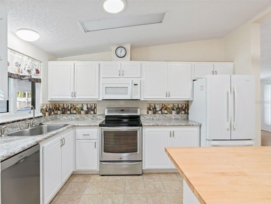 2-bedroom, 2-bath manufactured home ideally located in the heart on Orange Blossom Hills Golf and Country Club in Florida - for sale on GolfHomes.com, golf home, golf lot