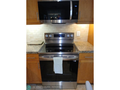 REMODELED BEAUTIFUL 1ST FLOOR CONDO! This RARE 1st Floor Golf on Palm-Aire Country Club and Resort - Palms in Florida - for sale on GolfHomes.com, golf home, golf lot