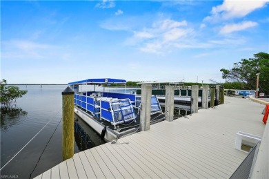 Step into this beautifully updated, turnkey furnished, 3-bedroom on Pelicans Nest Golf Club in Florida - for sale on GolfHomes.com, golf home, golf lot