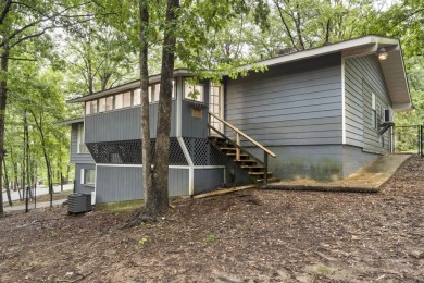 This beautifully remodeled home in Hot Springs Village offers on Cortez Golf Course in Arkansas - for sale on GolfHomes.com, golf home, golf lot