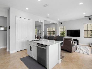 Discover luxury living in this exquisite five-bedroom on Eagle Creek Golf Club in Florida - for sale on GolfHomes.com, golf home, golf lot