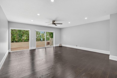 THIS BEAUTIFUL TOWNHOUSE, IS TOTALLY REVOVATED AND MOVE IN on Deer Creek Golf Club in Florida - for sale on GolfHomes.com, golf home, golf lot