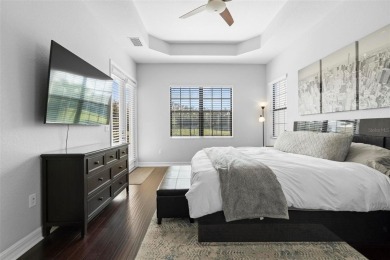 Discover luxury living in this exquisite five-bedroom on Eagle Creek Golf Club in Florida - for sale on GolfHomes.com, golf home, golf lot