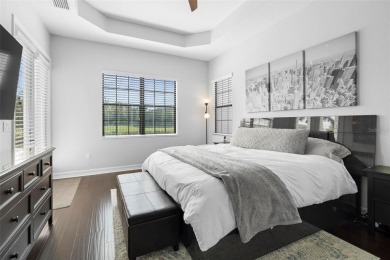 Discover luxury living in this exquisite five-bedroom on Eagle Creek Golf Club in Florida - for sale on GolfHomes.com, golf home, golf lot