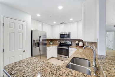 GOLF MEMBERSHIP INLCUDED! This First Floor Coach Home offers a on Bonita National Golf Course in Florida - for sale on GolfHomes.com, golf home, golf lot