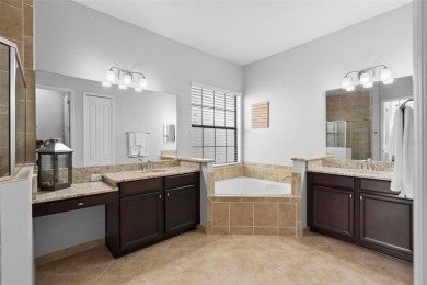 Discover luxury living in this exquisite five-bedroom on Eagle Creek Golf Club in Florida - for sale on GolfHomes.com, golf home, golf lot