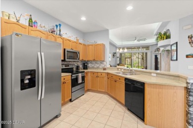 This charming attached villa, is located in the Award Winning on LPGA International Golf Course in Florida - for sale on GolfHomes.com, golf home, golf lot
