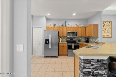 This charming attached villa, is located in the Award Winning on LPGA International Golf Course in Florida - for sale on GolfHomes.com, golf home, golf lot