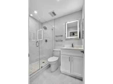 THIS BEAUTIFUL TOWNHOUSE, IS TOTALLY REVOVATED AND MOVE IN on Deer Creek Golf Club in Florida - for sale on GolfHomes.com, golf home, golf lot