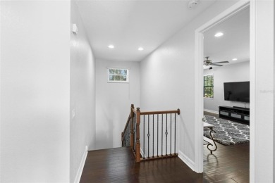 Discover luxury living in this exquisite five-bedroom on Eagle Creek Golf Club in Florida - for sale on GolfHomes.com, golf home, golf lot