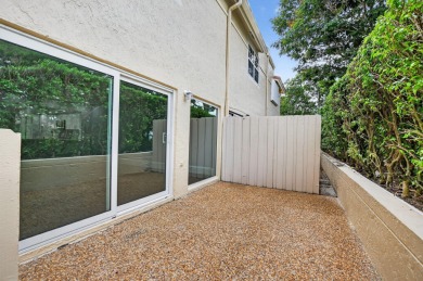 THIS BEAUTIFUL TOWNHOUSE, IS TOTALLY REVOVATED AND MOVE IN on Deer Creek Golf Club in Florida - for sale on GolfHomes.com, golf home, golf lot