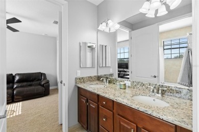 Discover luxury living in this exquisite five-bedroom on Eagle Creek Golf Club in Florida - for sale on GolfHomes.com, golf home, golf lot