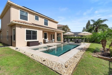 Discover luxury living in this exquisite five-bedroom on Eagle Creek Golf Club in Florida - for sale on GolfHomes.com, golf home, golf lot