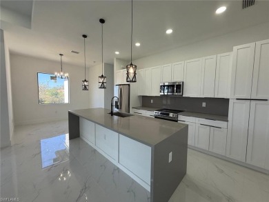 Welcome to a breathtaking new construction single-family home on Del Tura Golf and Country Club in Florida - for sale on GolfHomes.com, golf home, golf lot