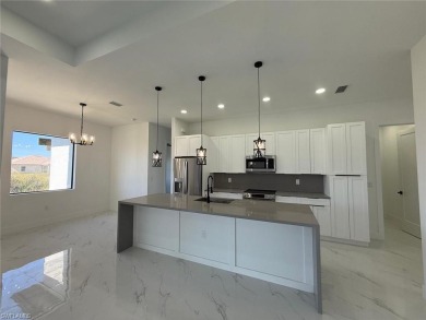 Welcome to a breathtaking new construction single-family home on Del Tura Golf and Country Club in Florida - for sale on GolfHomes.com, golf home, golf lot