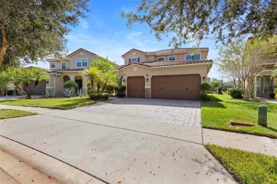 Discover luxury living in this exquisite five-bedroom on Eagle Creek Golf Club in Florida - for sale on GolfHomes.com, golf home, golf lot