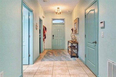 One or more photo(s) has been virtually staged. Welcome to 1424 on The Oasis Club at Champions Gate in Florida - for sale on GolfHomes.com, golf home, golf lot