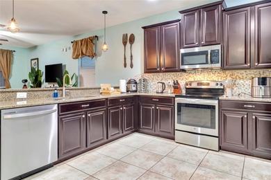 One or more photo(s) has been virtually staged. Welcome to 1424 on The Oasis Club at Champions Gate in Florida - for sale on GolfHomes.com, golf home, golf lot