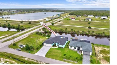 WOW! 2024 Gulf Access Pool Home on a Wide Canal - One Bridge to on Burnt Store Golf Club in Florida - for sale on GolfHomes.com, golf home, golf lot