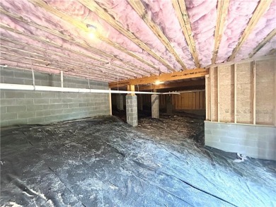 New construction on a spacious .31-acre wooded lot with a level on Bella Vista - Metfield Golf Complex and Country Club in Arkansas - for sale on GolfHomes.com, golf home, golf lot