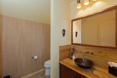 An exceptional home in a rare, private location within easy on Hapuna Golf Course in Hawaii - for sale on GolfHomes.com, golf home, golf lot