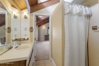 Frank Lloyd Wright-Inspired Mid-Century Modern Masterpiece on on Colonial Country Club Deerfield in Mississippi - for sale on GolfHomes.com, golf home, golf lot