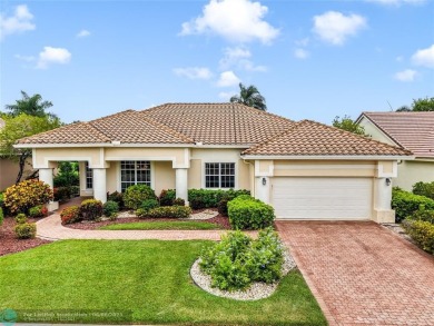 Experience the best of Florida living in this beautifully on Aberdeen Golf and Country Club in Florida - for sale on GolfHomes.com, golf home, golf lot