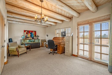 Beautifully situated in one Santa Fe's premiere master-planned on Quail Run Golf Course in New Mexico - for sale on GolfHomes.com, golf home, golf lot