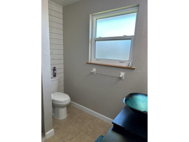 *Turnkey, updated, and solar-powered -- this Deep Creek gem on Deep Creek Golf Club in Florida - for sale on GolfHomes.com, golf home, golf lot
