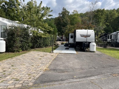 Absolutely beautiful creek front lot with large concrete deck on Bent Creek Golf Course in Tennessee - for sale on GolfHomes.com, golf home, golf lot