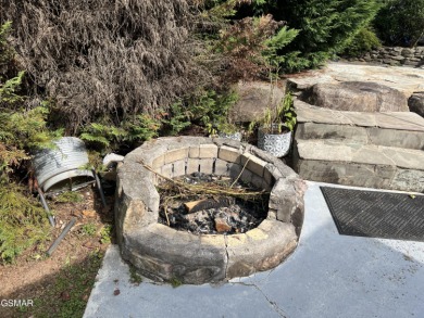Absolutely beautiful creek front lot with large concrete deck on Bent Creek Golf Course in Tennessee - for sale on GolfHomes.com, golf home, golf lot